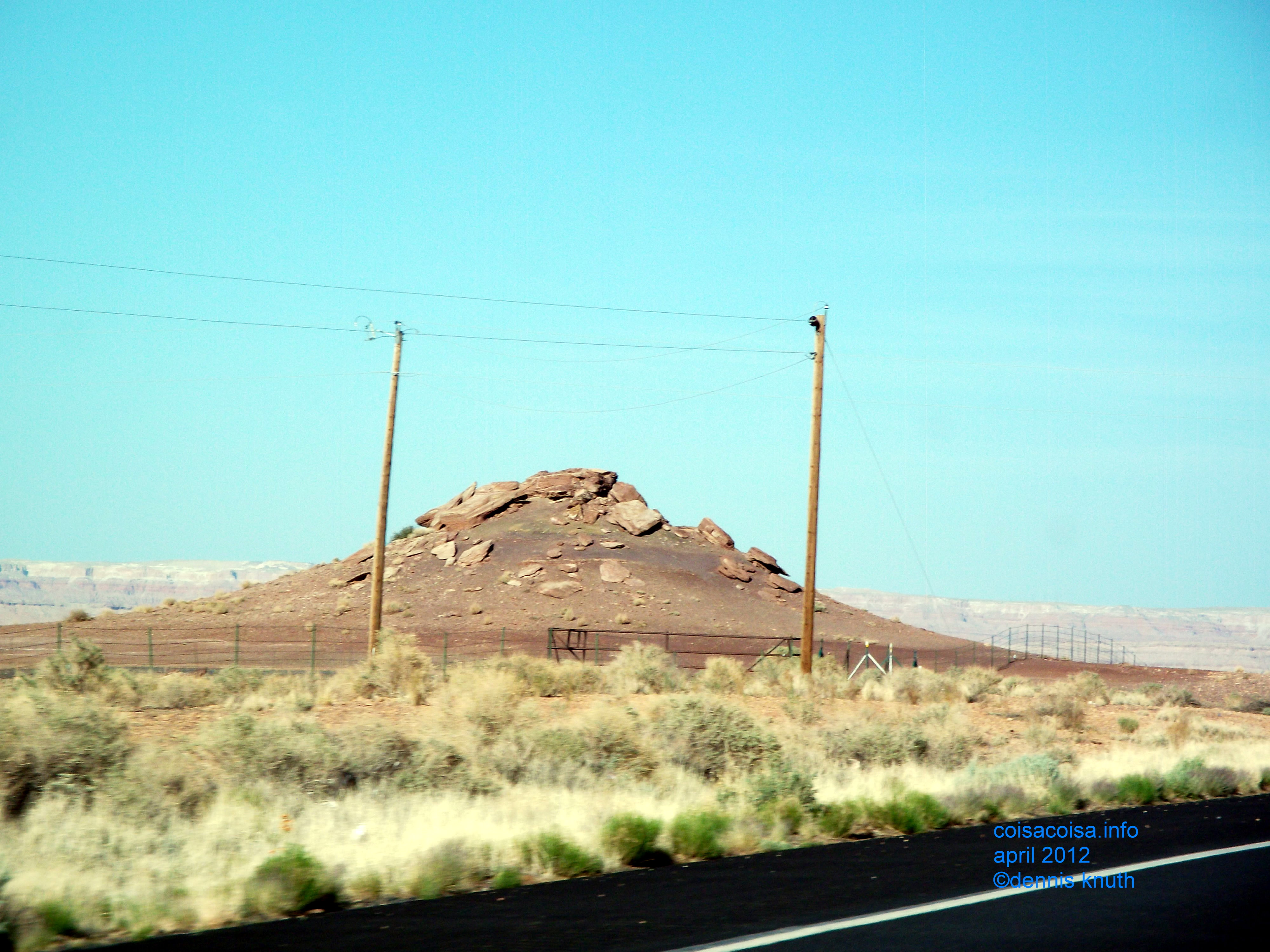 Broken mound with flat slabs of stone in the painted desert