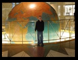 Helton at the World Globe in His Office