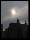 September sun obscured by clouds in Manhattan