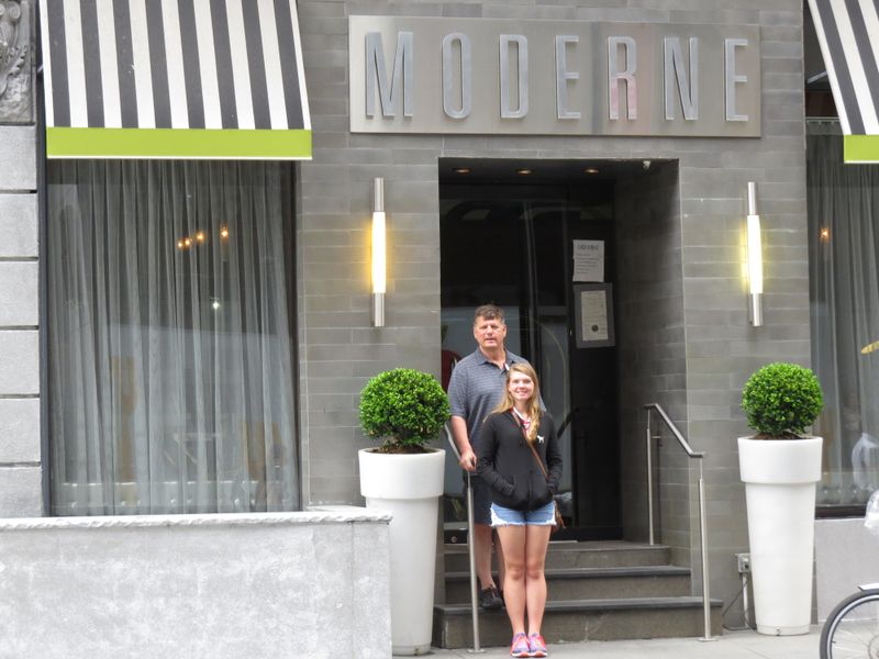 Abbey and Tom at the entrance of the Moderne Hotel on 55th Street