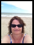 Sherri takes a selfie on the beach