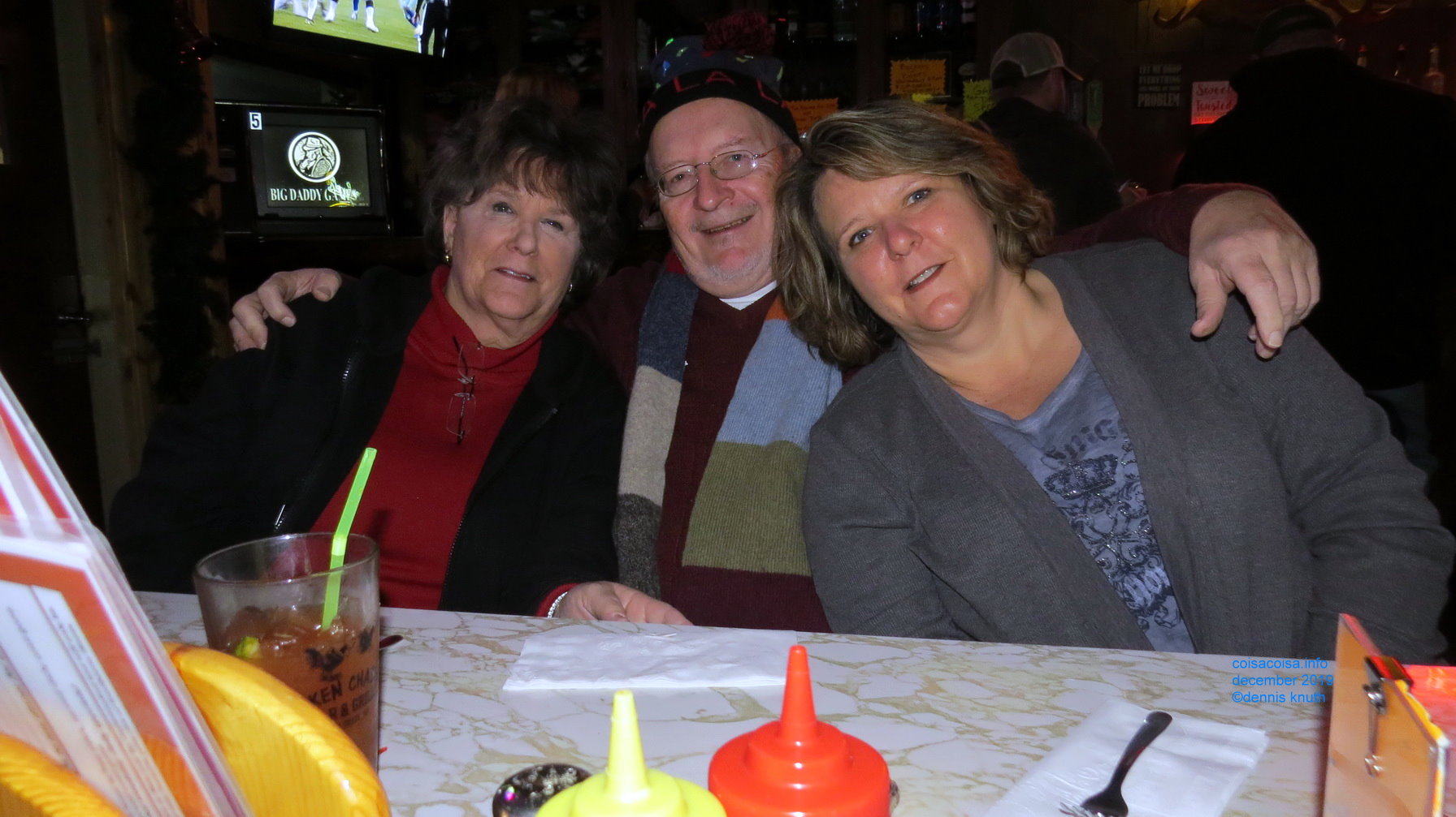 Peggy, Dennis Knuth, Debbie at the Birthday Party Table
