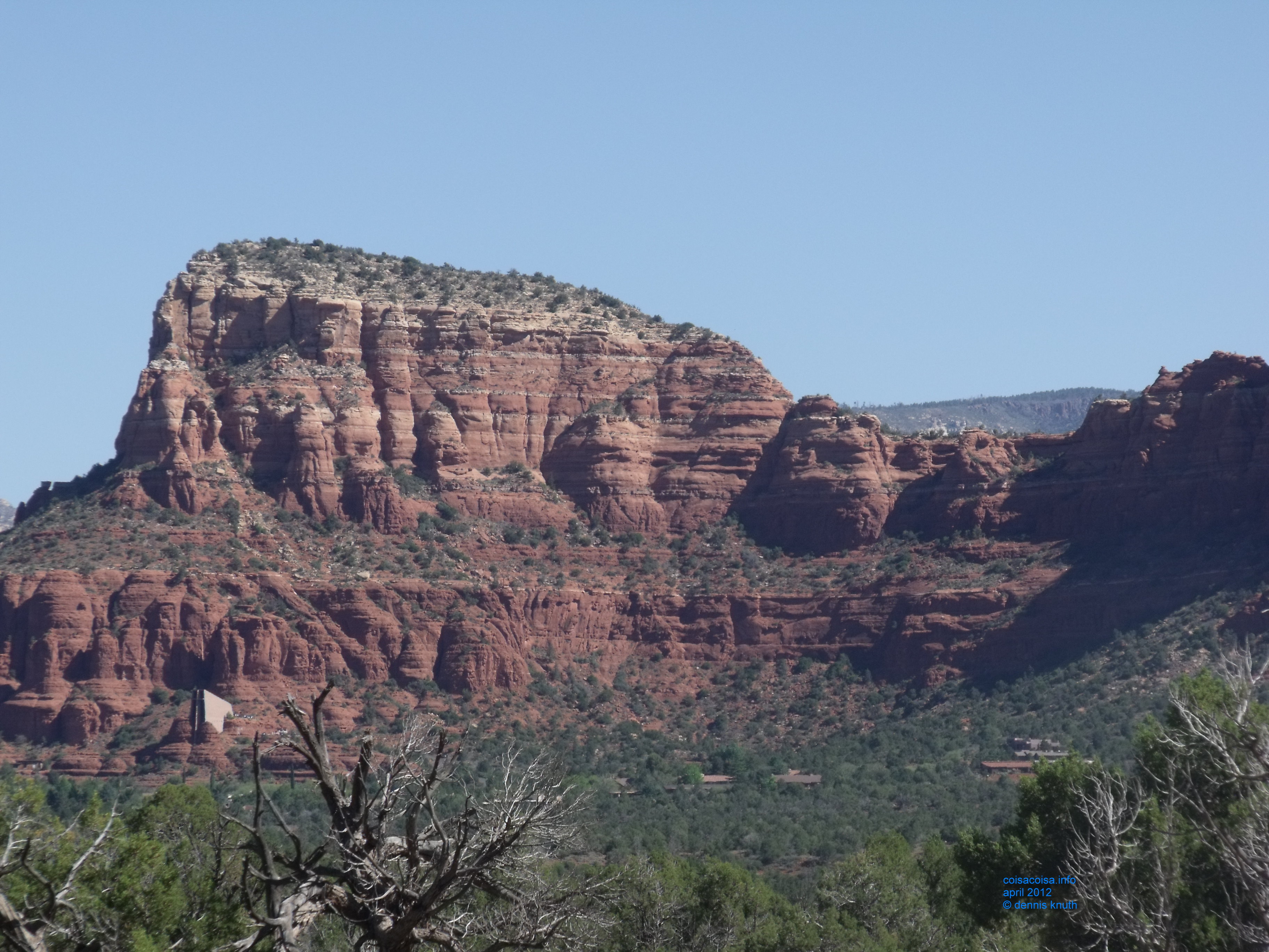 Homes in Sedona near a red rock bluff