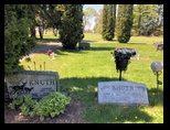 Planting some flowers on John Knuth's grave in Augusta Wisconsin